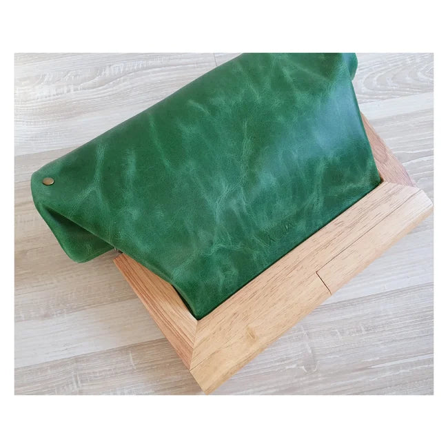 Green suede sales clutch bag